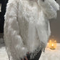 The Vogue beaded faux fur coat