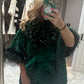 The Elpheba Green faux fur coat